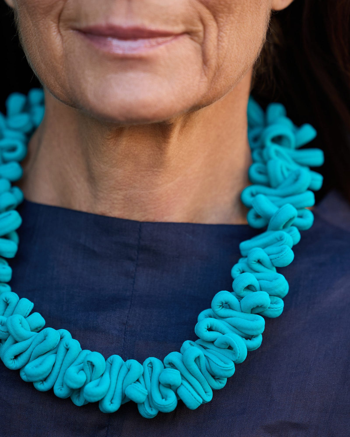 Woman wearing Capri Necklace