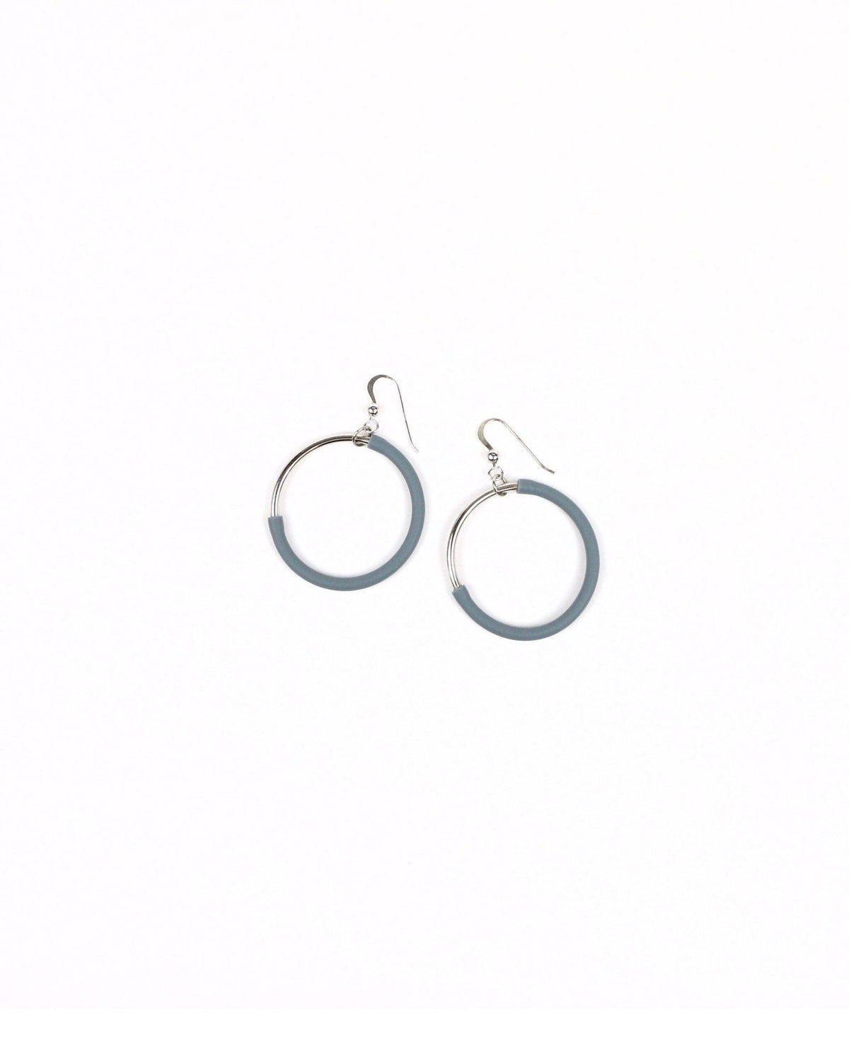 Woman wearing Eclissi Rhodium Earrings