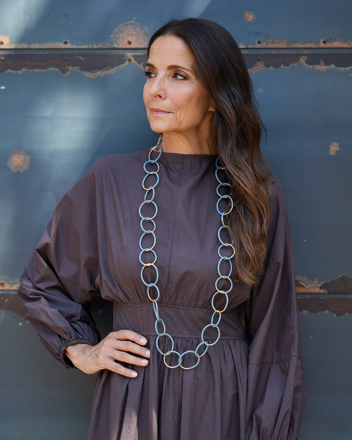 Woman wearing Eclissi Long Gold Necklace