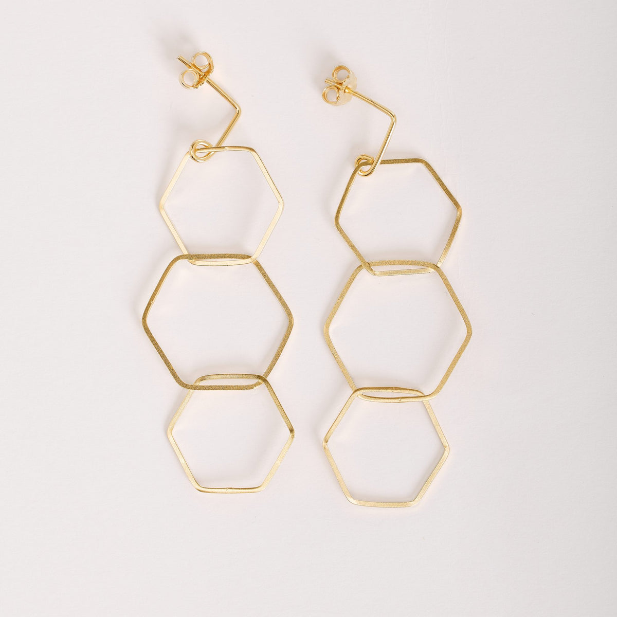 Orecchini Esa 3 Oro in argento 925, su fondo chiaro