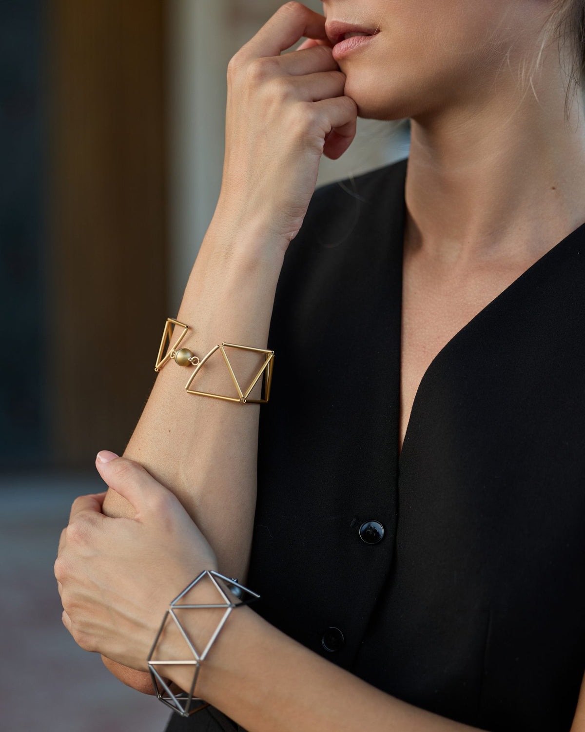 Greca Gold bracelet in gold-plated brass, worn