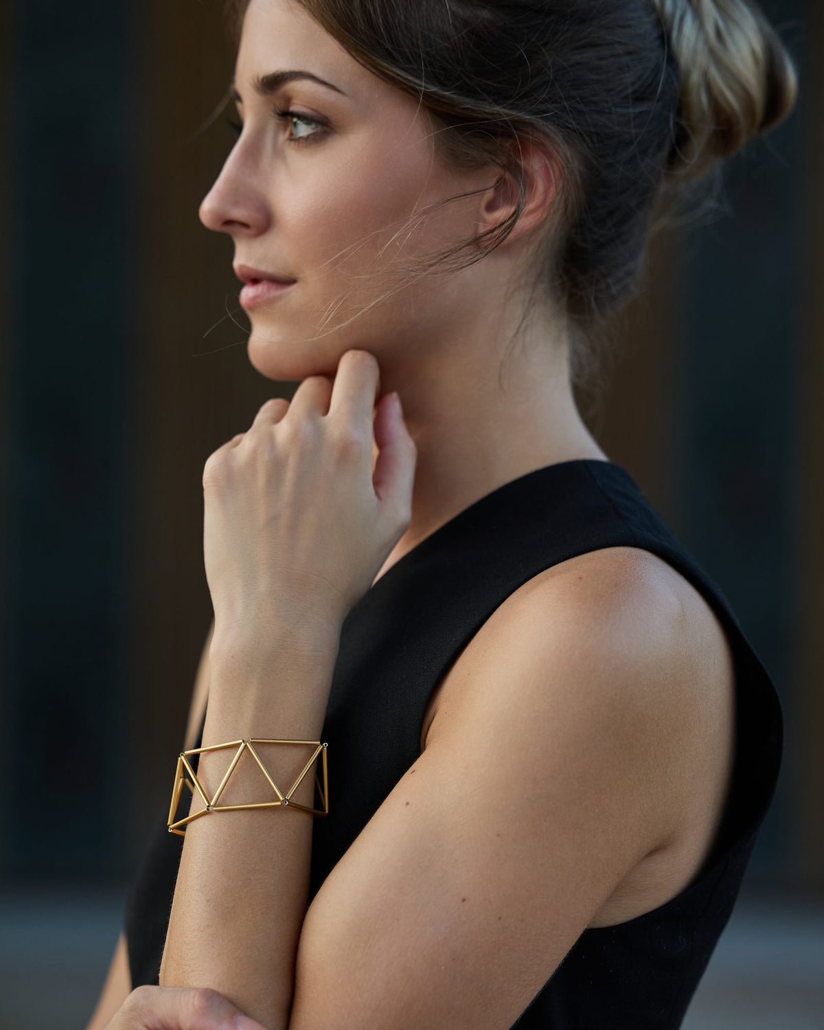 Greca Gold bracelet in gold-plated brass, worn