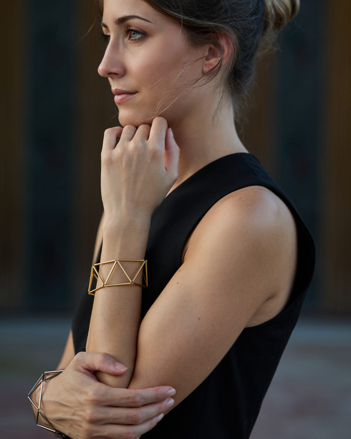 Greca Gold bracelet in gold-plated brass, worn