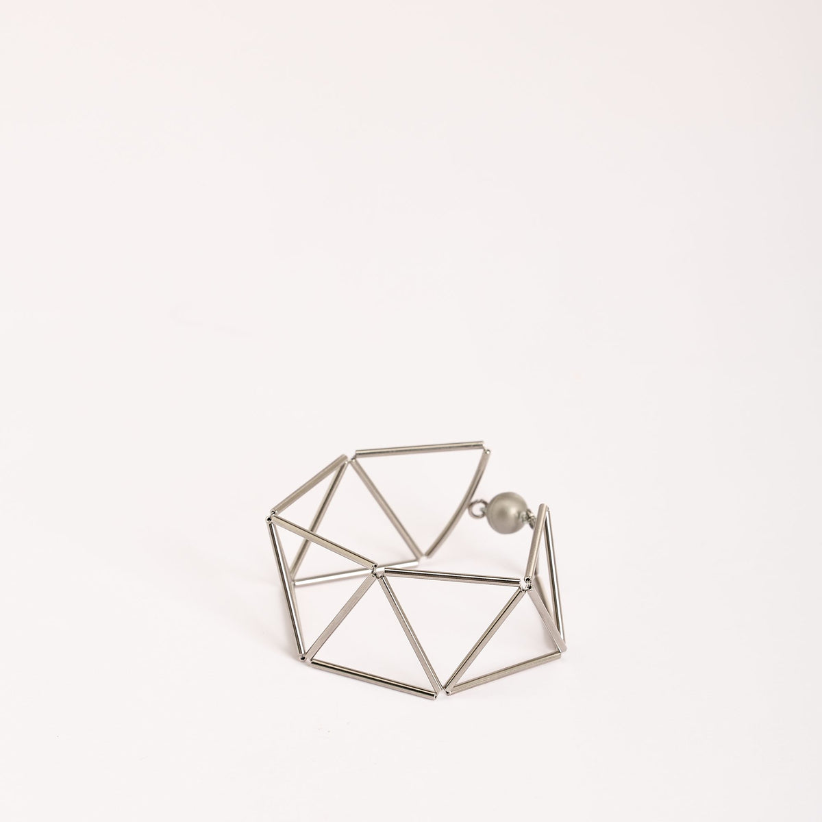 Greca Rhodium bracelet in rhodium-plated brass, on a white background