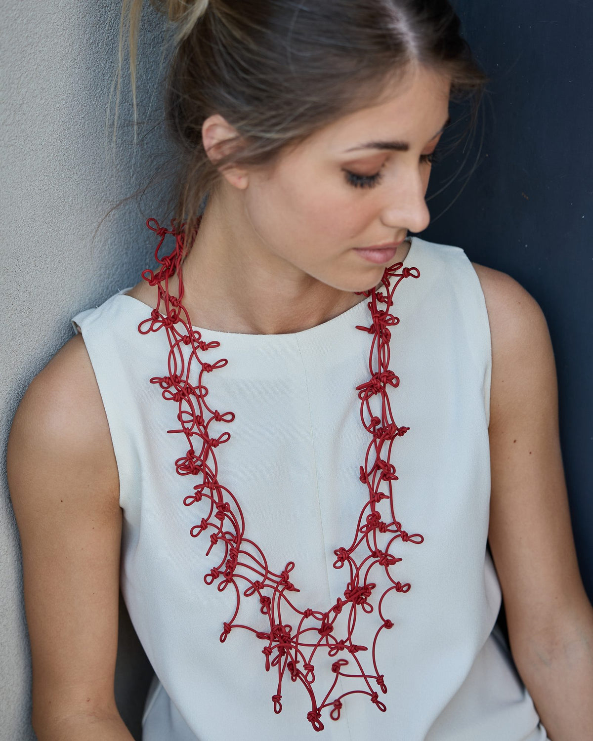 Woman wearing Knots Long Necklace