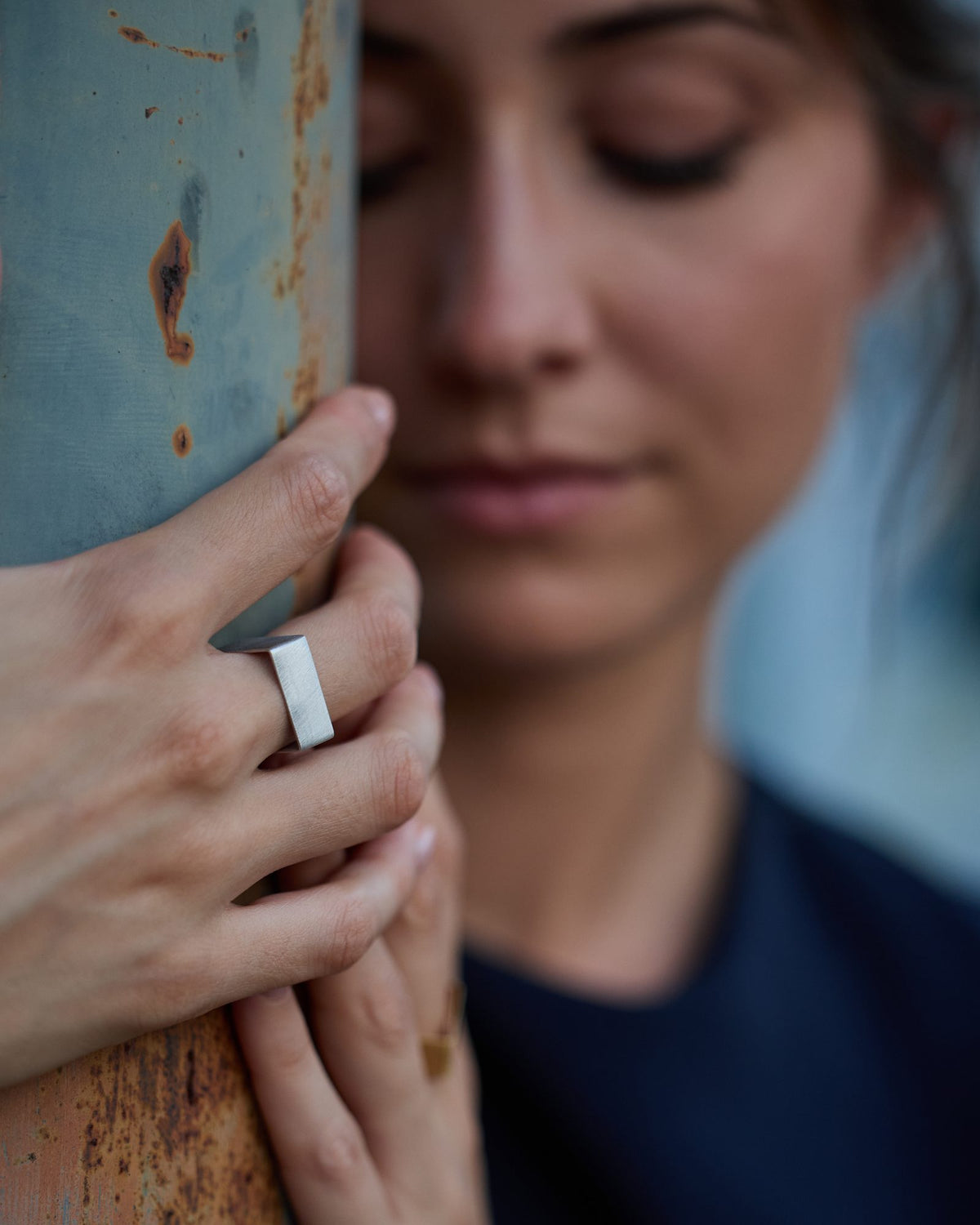 QB Mini Rhodium ring in 925 sterling silver, worn, close-up on the hand