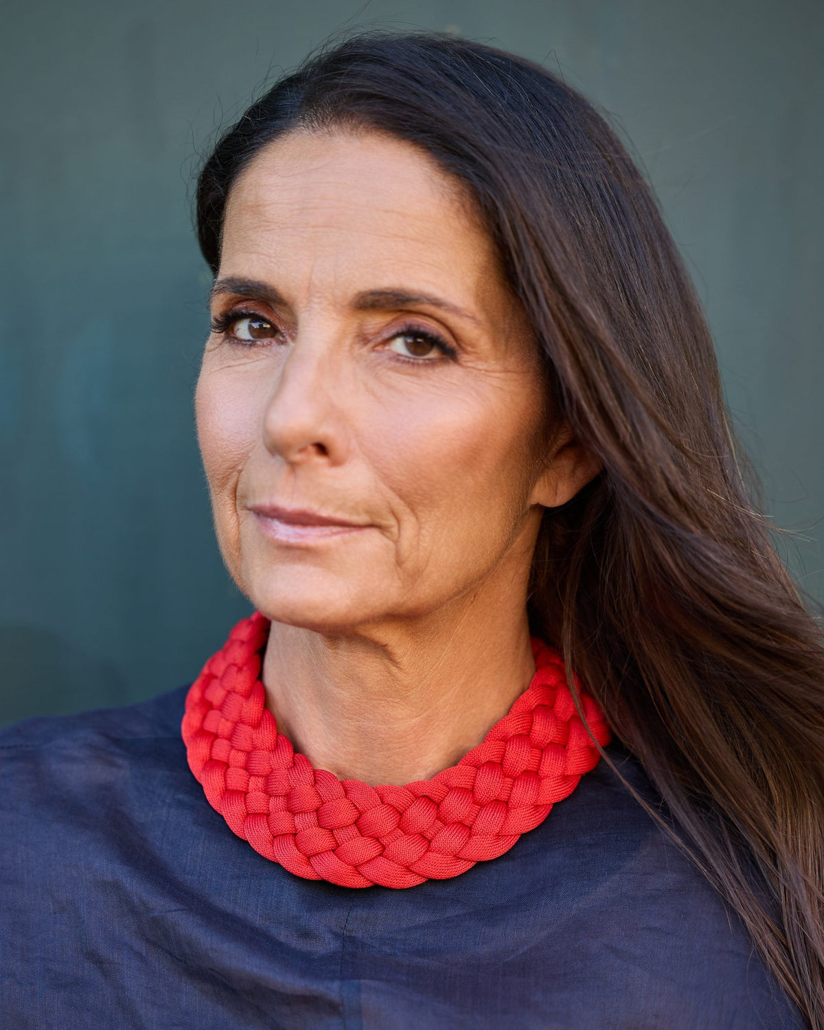 Woman wearing Queen Necklace