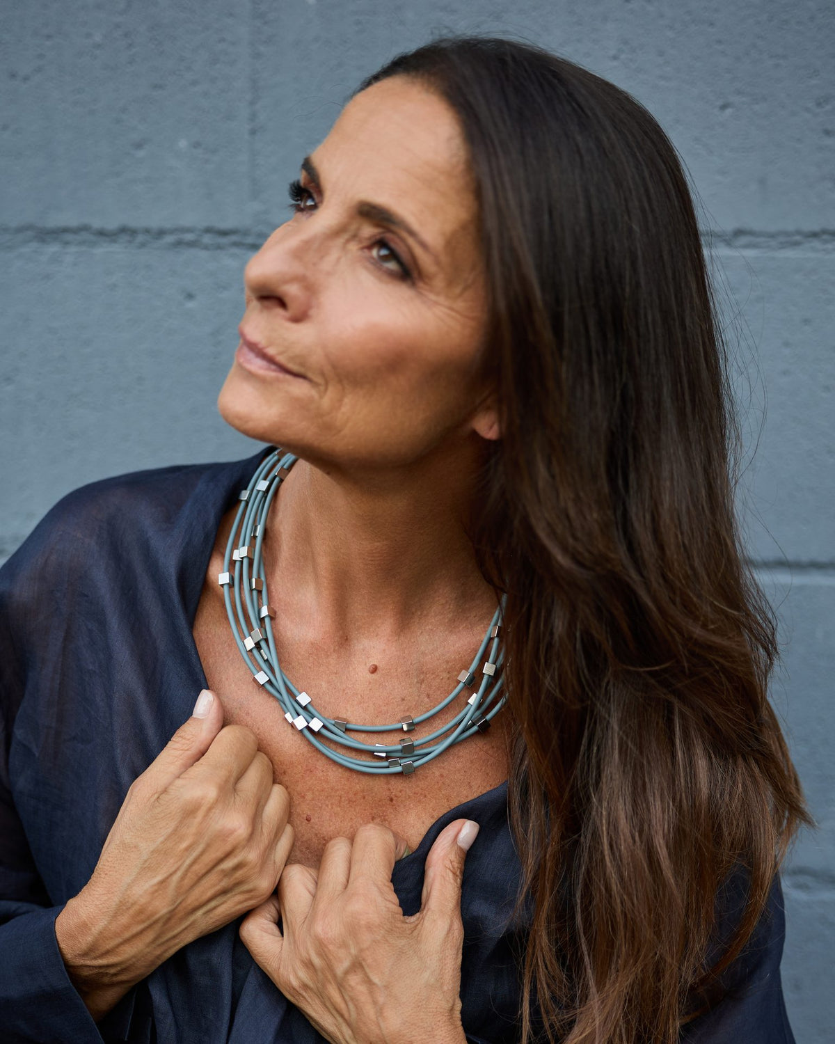 Woman wearing Sirio Necklace