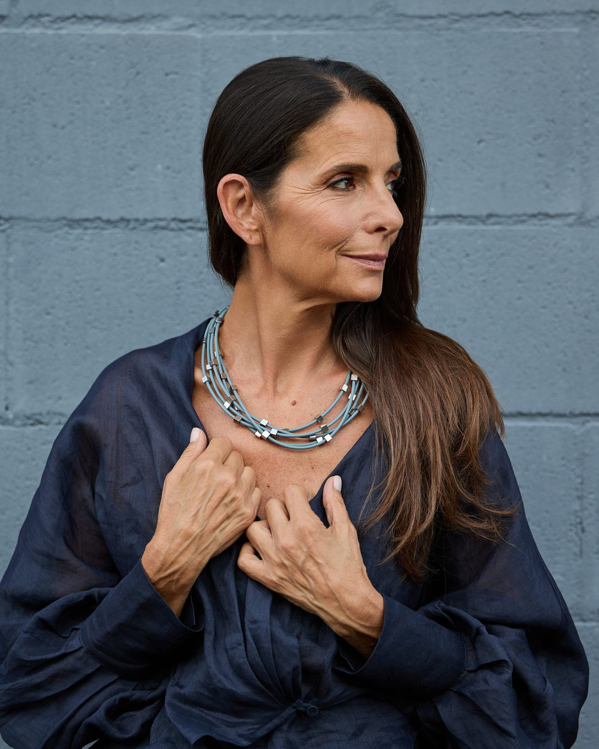 Woman wearing Sirio Necklace
