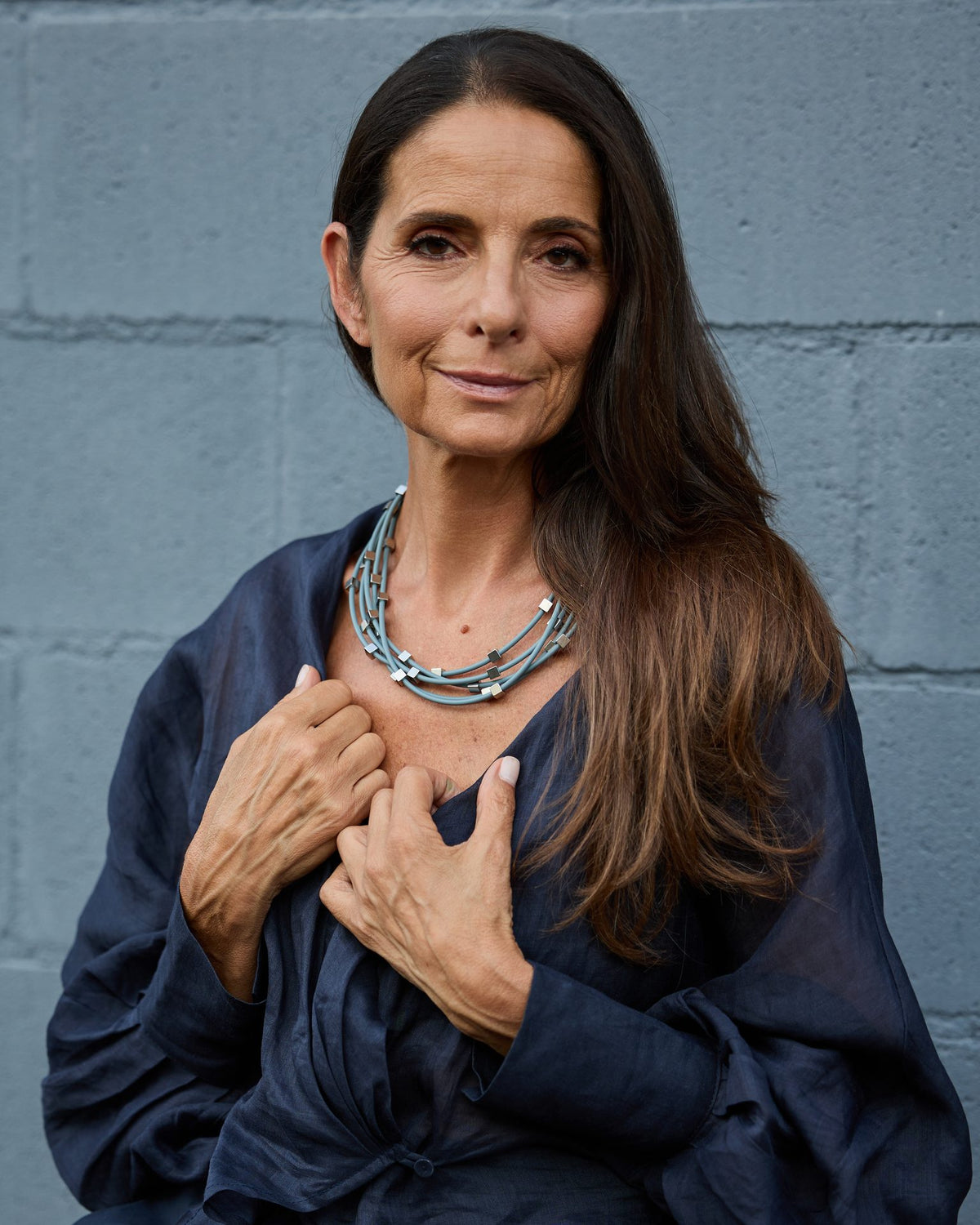 Woman wearing Sirio Necklace