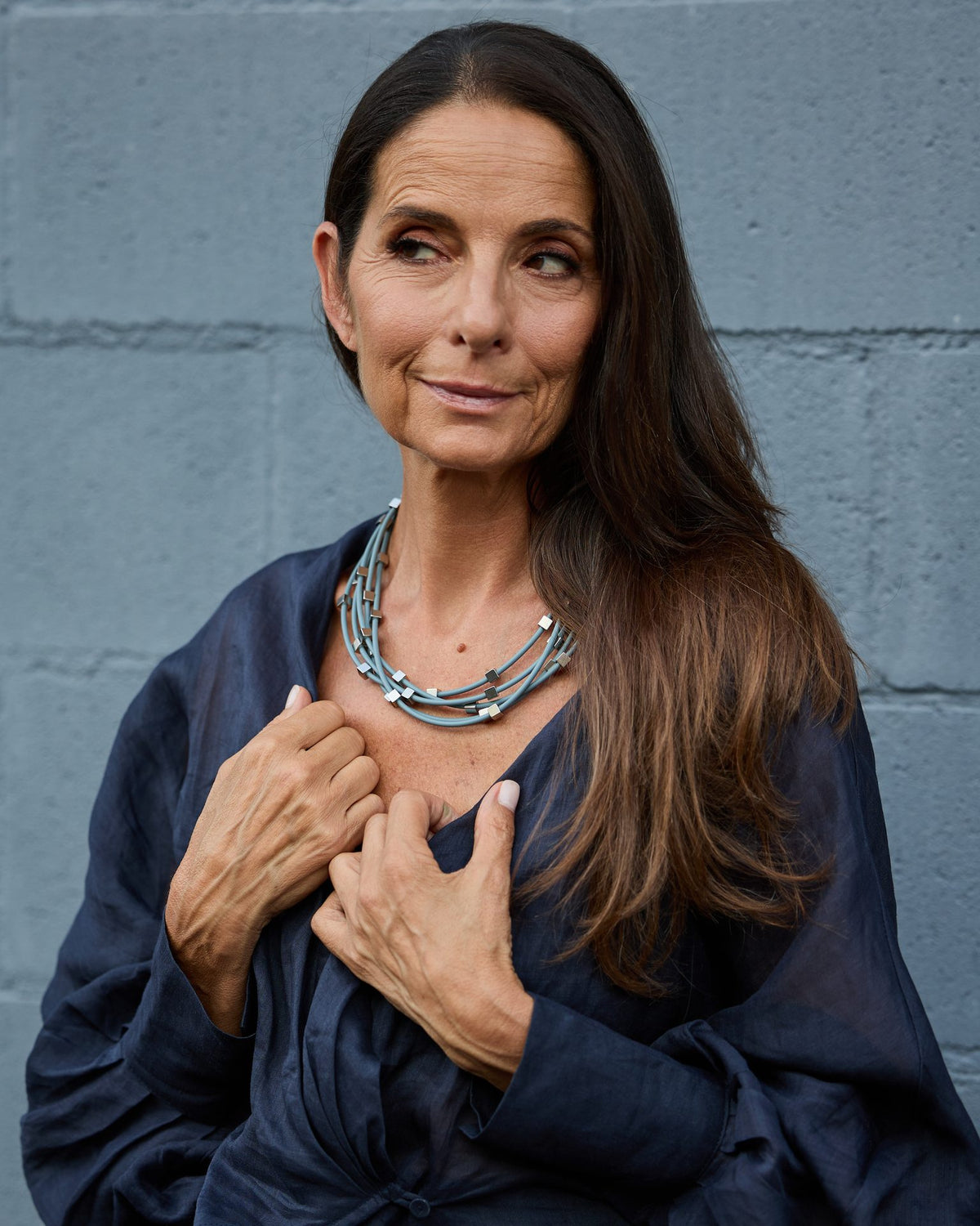 Woman wearing Sirio Necklace
