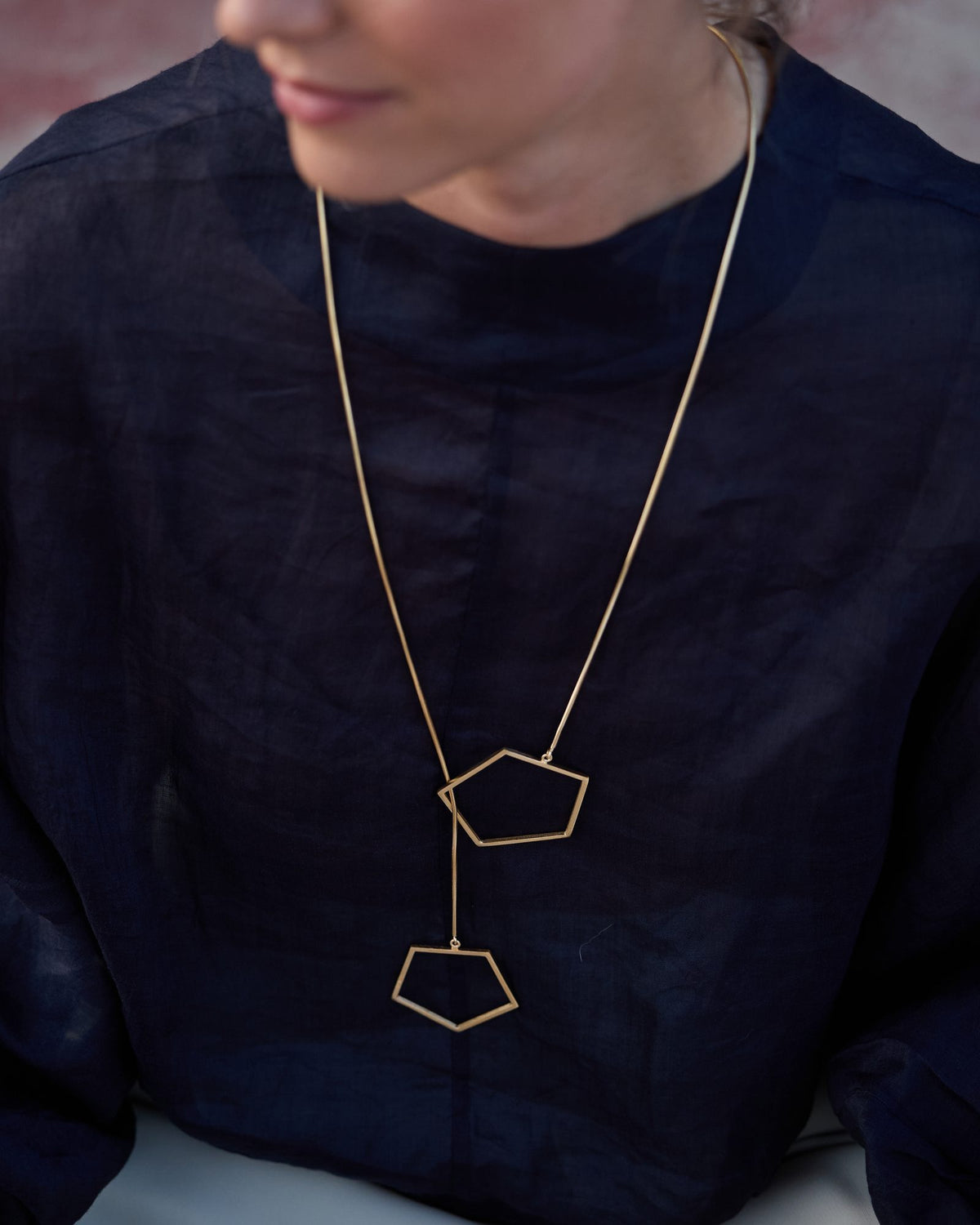 Sisters Gold necklace in 925 sterling silver, worn, close-up detail