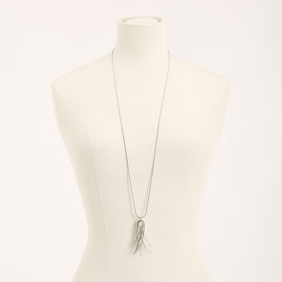 Vento Long Rhodium necklace in 925 sterling silver, on a light background