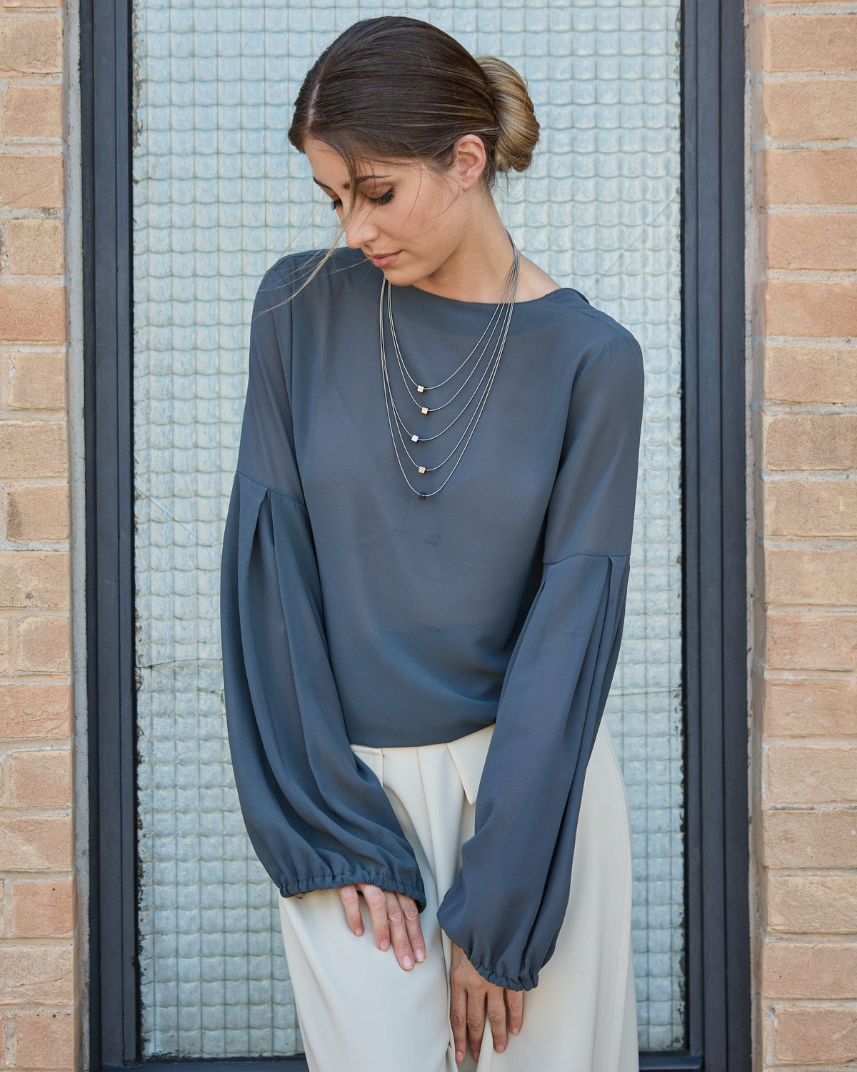 Wave Short necklace in steel, worn
