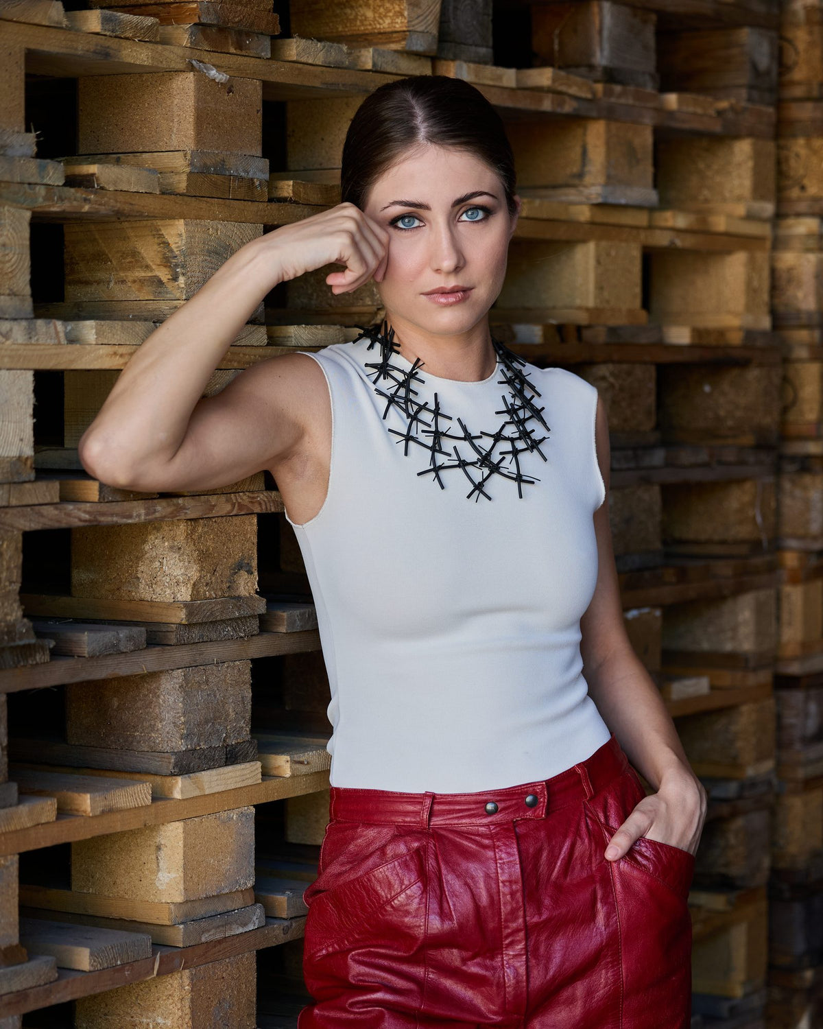 Woman wearing X Necklace