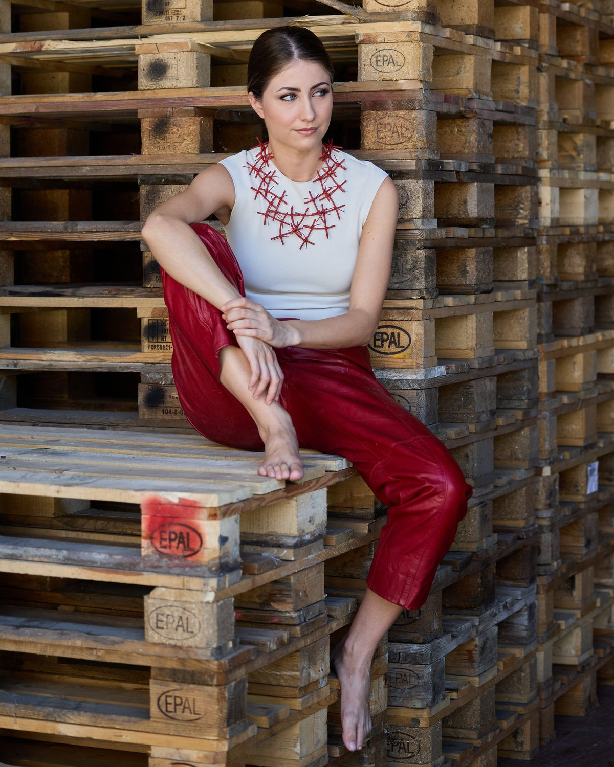 Woman wearing X Necklace