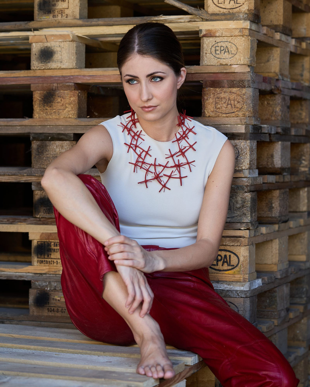 Woman wearing X Necklace