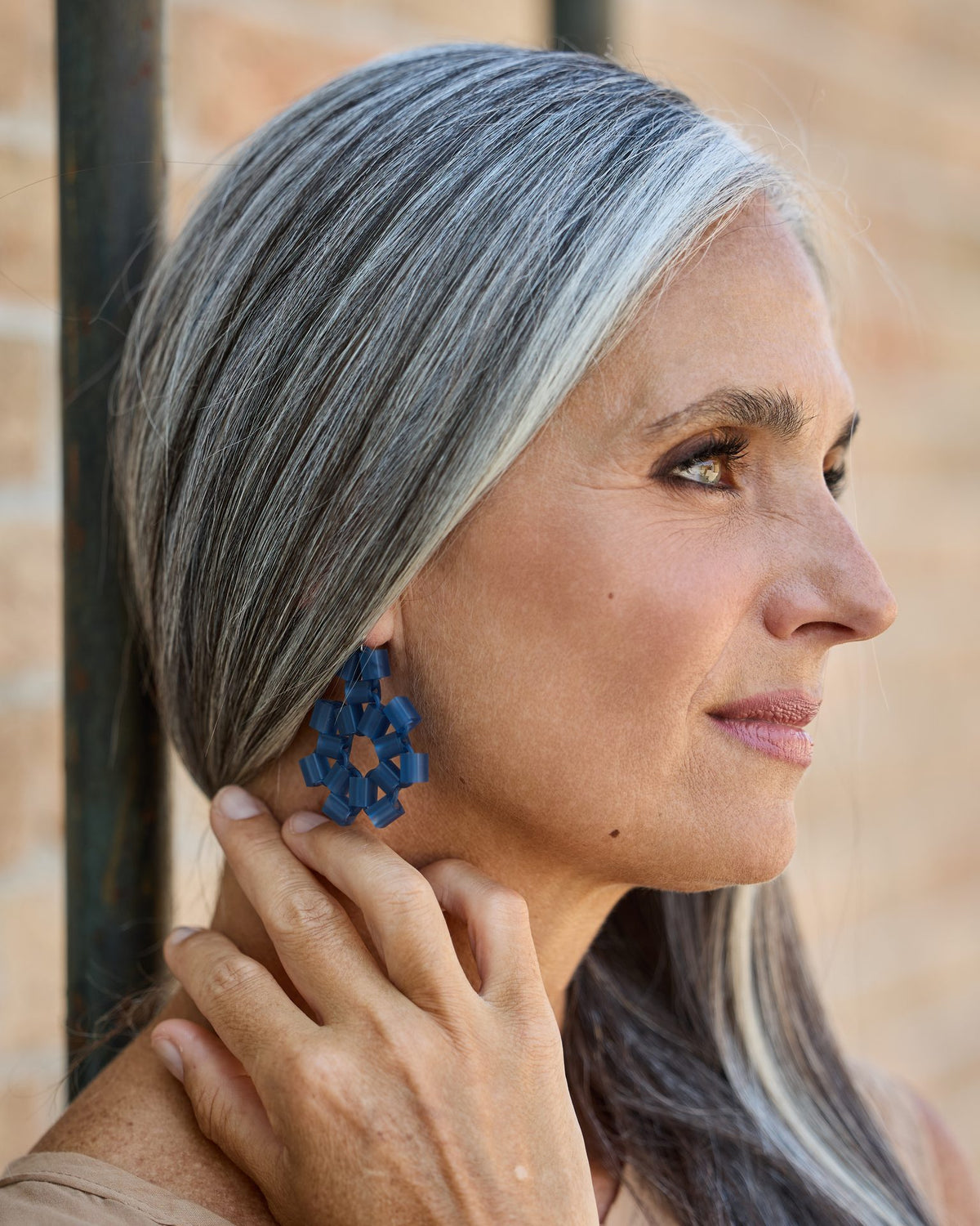 Woman wearing Block Earrings