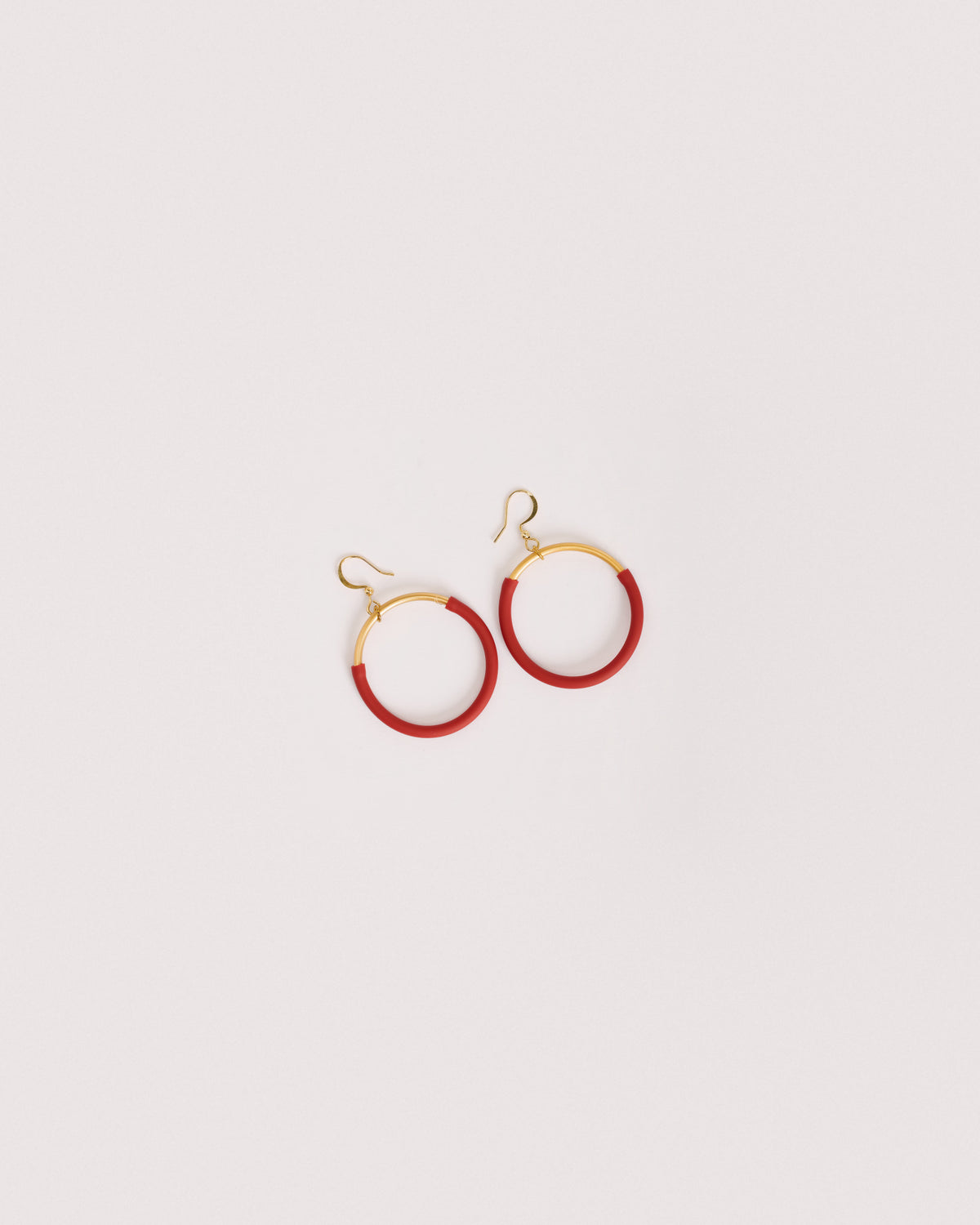 Woman wearing Eclissi Gold Earrings