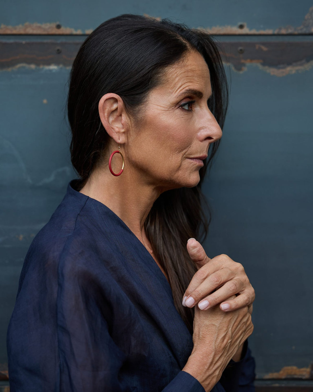 Woman wearing Eclissi Gold Earrings