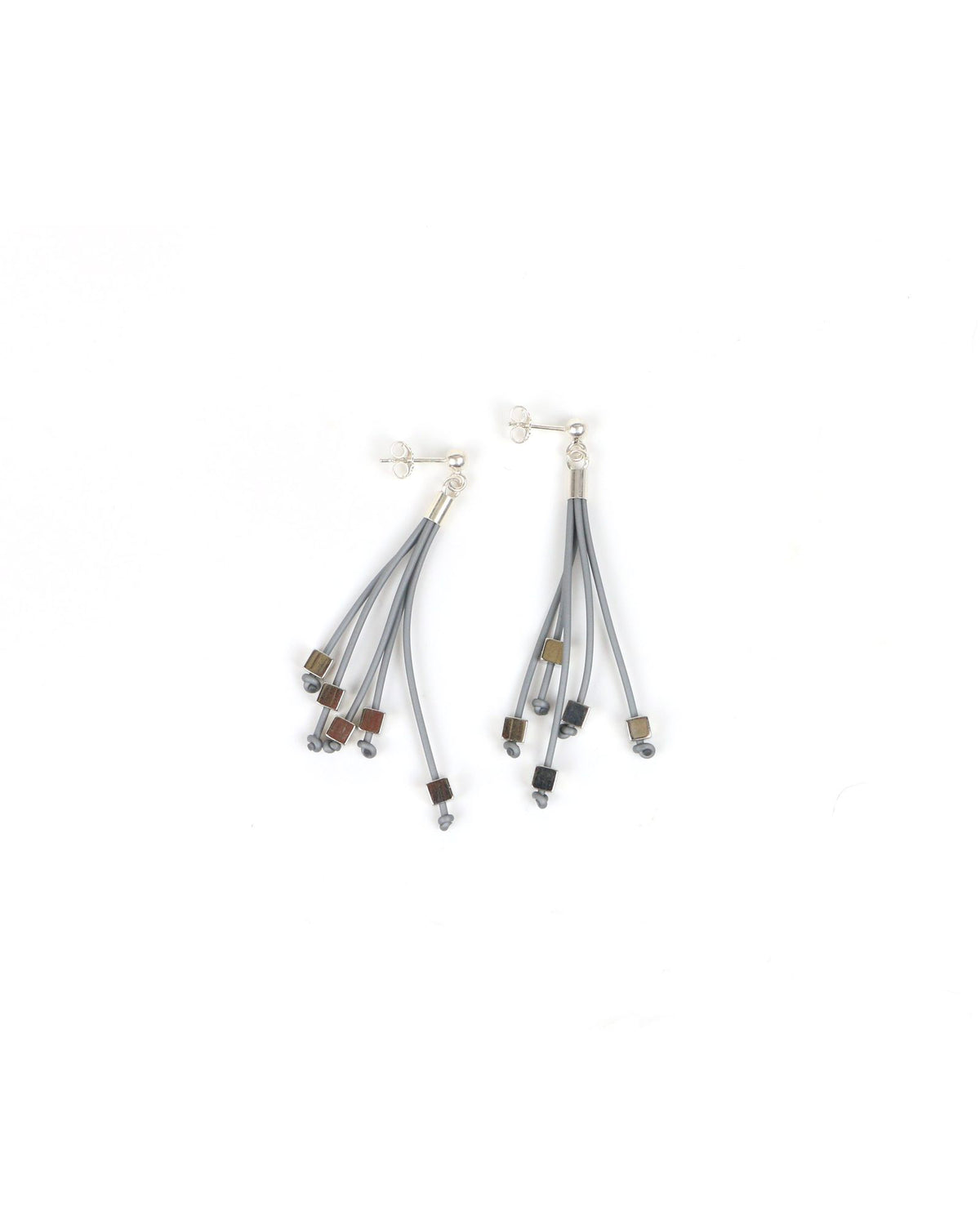 Woman wearing Luce Earrings
