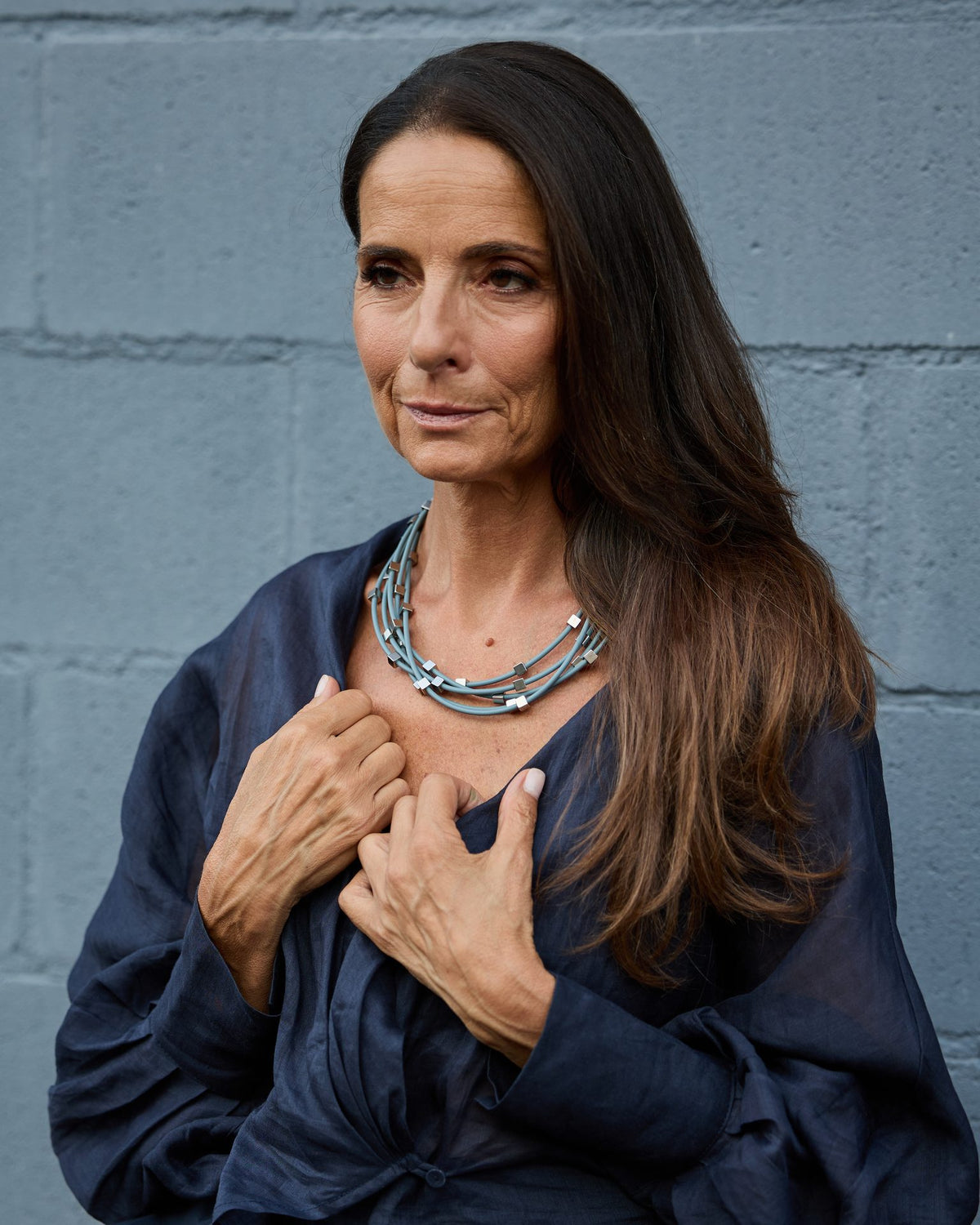Woman wearing Sirio Necklace