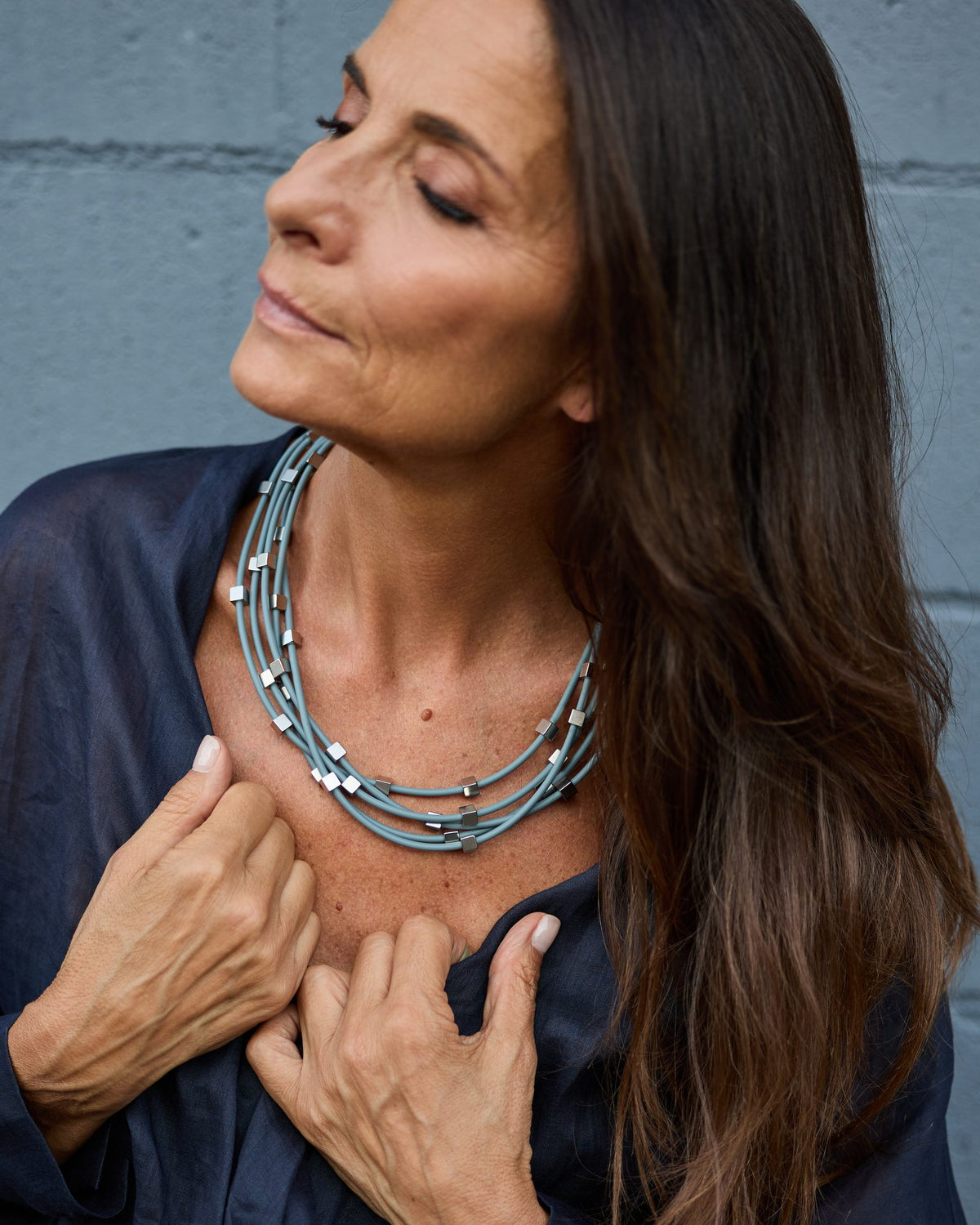 Woman wearing Sirio Necklace