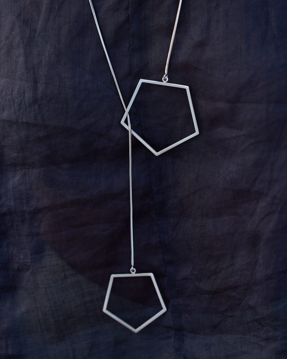 Sisters Rhodium necklace in 925 sterling silver, worn, close-up detail