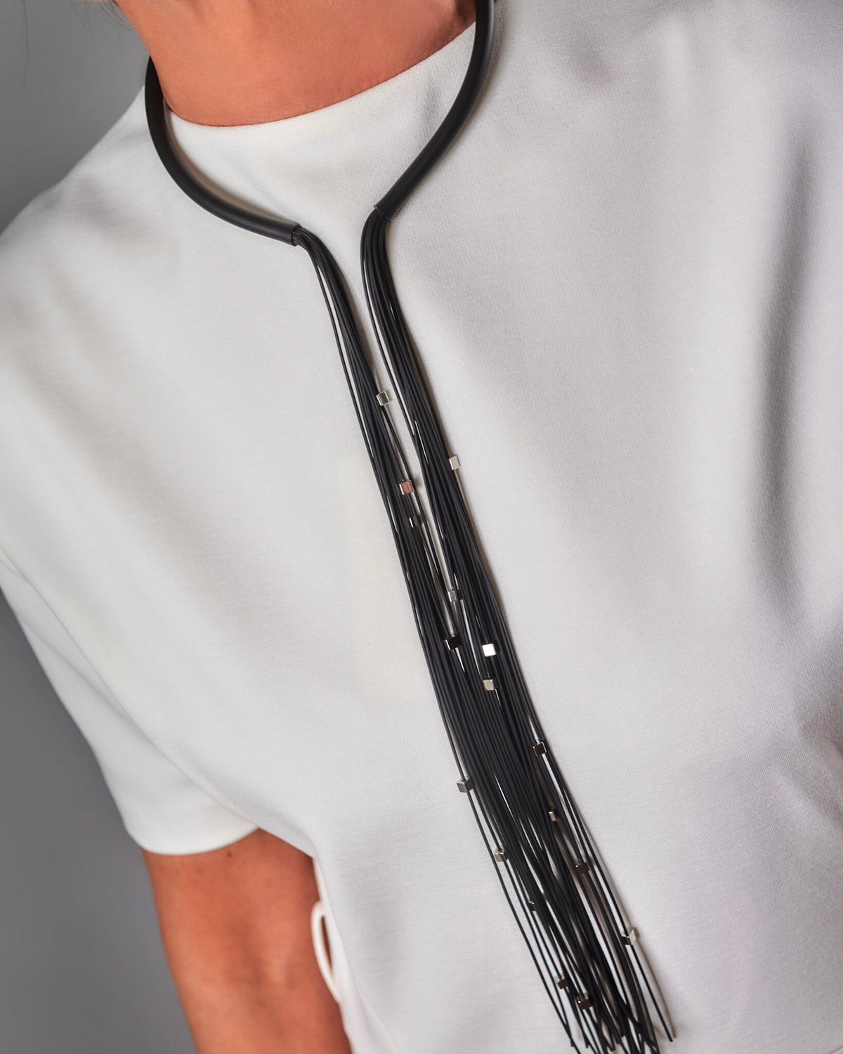 Tie collana