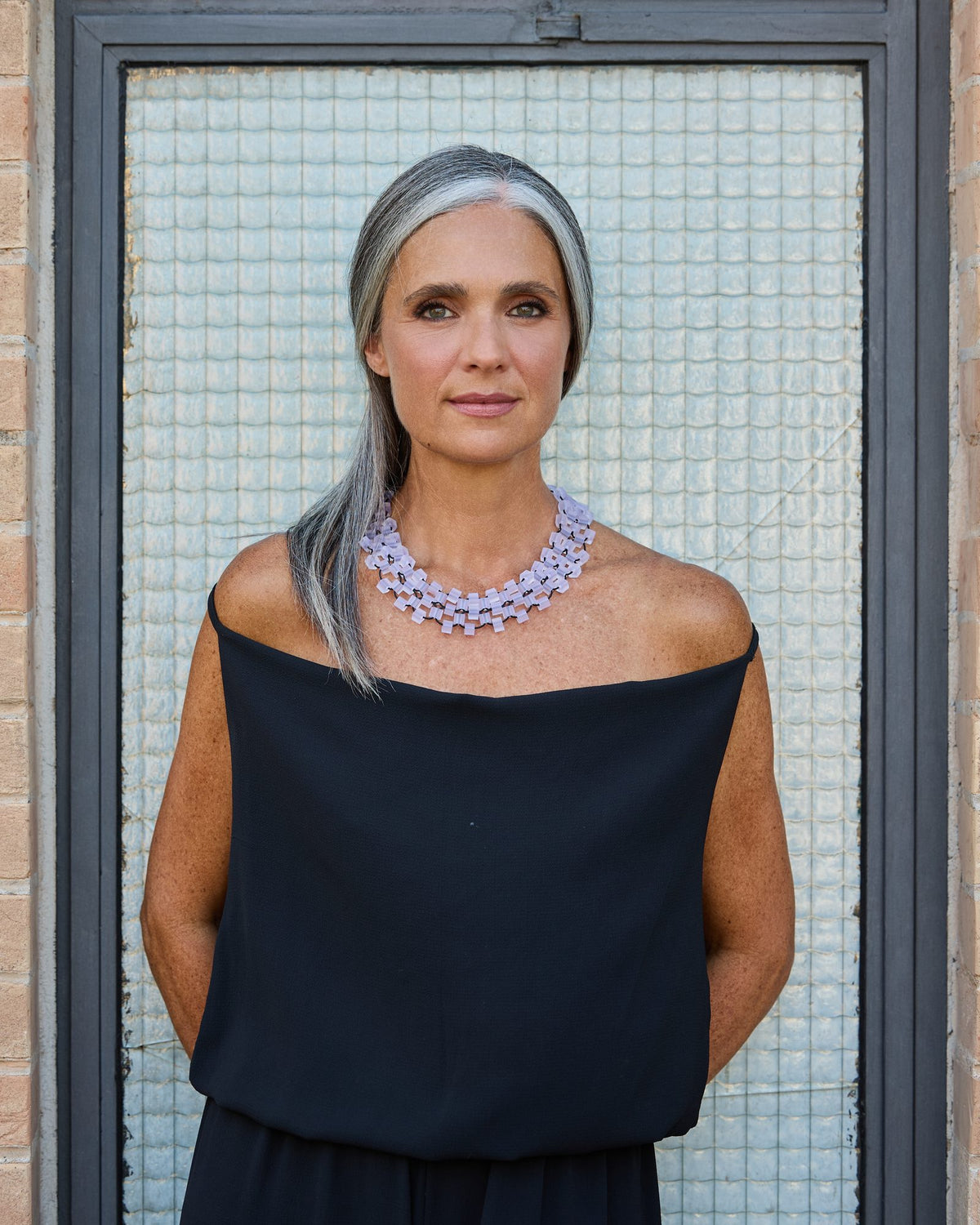 Donna con la Collana Torre