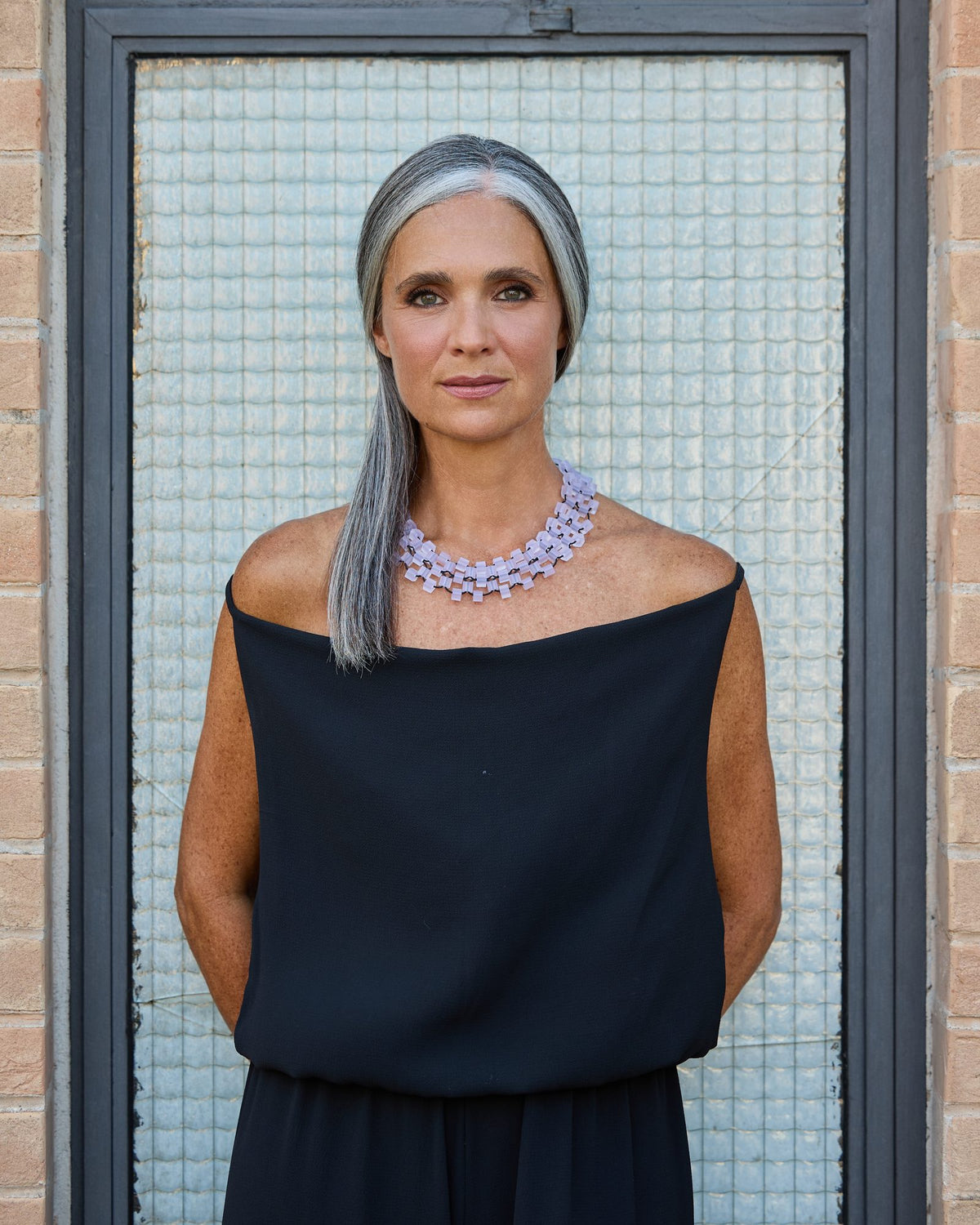 Donna con la Collana Torre