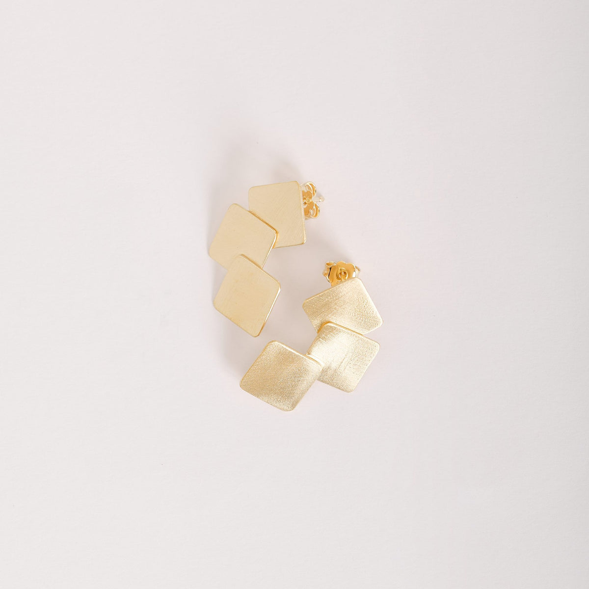 Orecchini Trifolium Oro in argento 925, su fondo chiaro