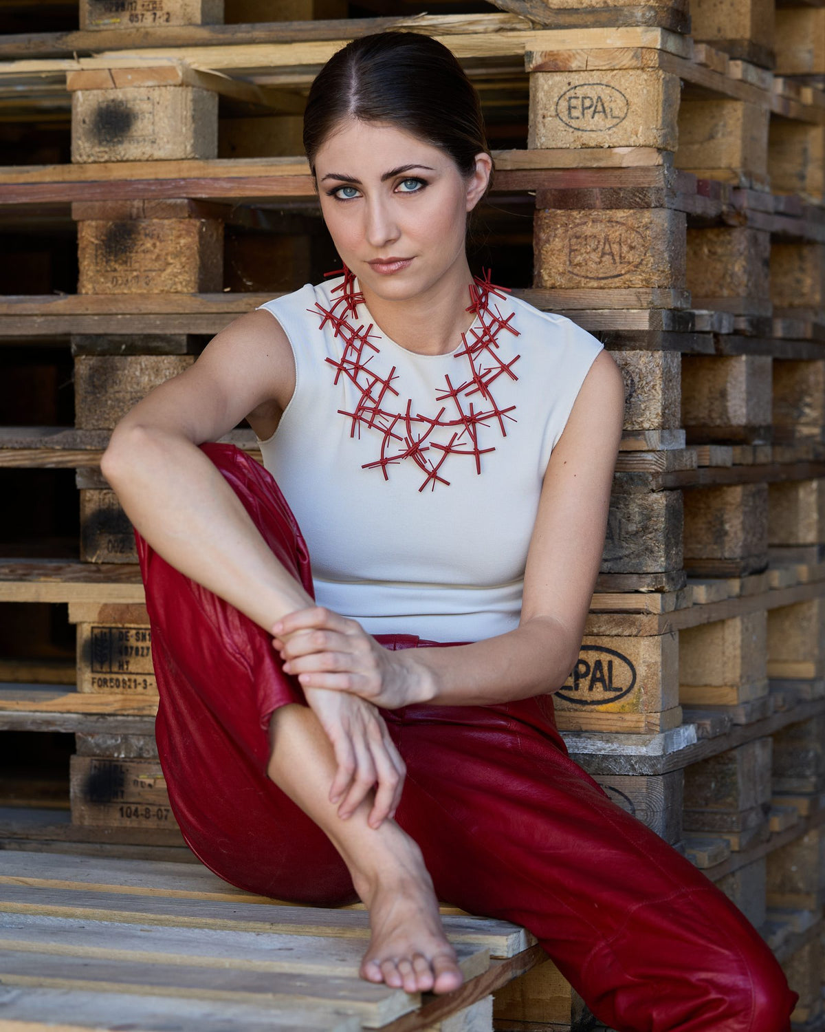 Woman wearing X Necklace